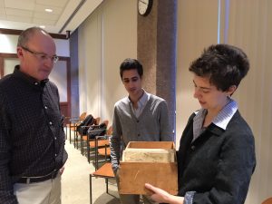 Louisa Winchell and Mat Shelley-Reade returning the box of 1922 aerial photographs used for their project to Roger Palmer (City of Middletown).